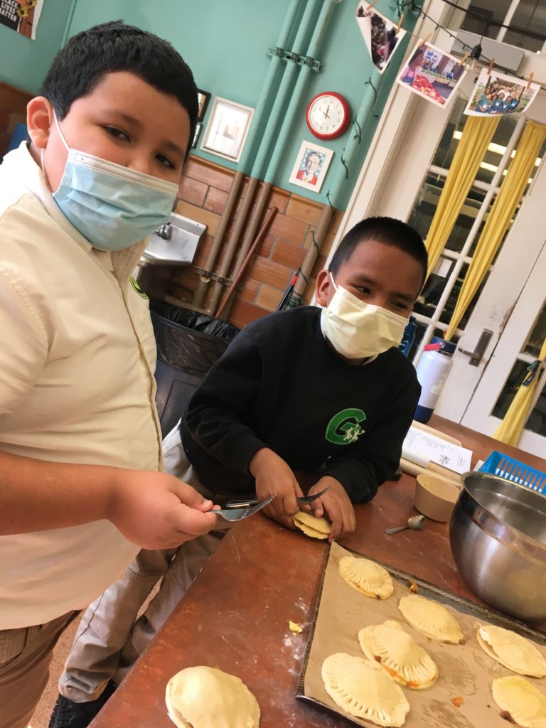 students cooking together